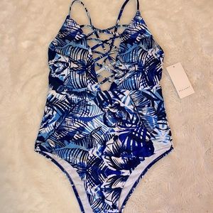 Women’s one piece blue lace up swimsuit sz M